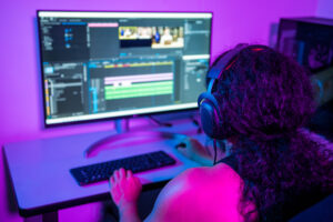 Image of video editor at desk